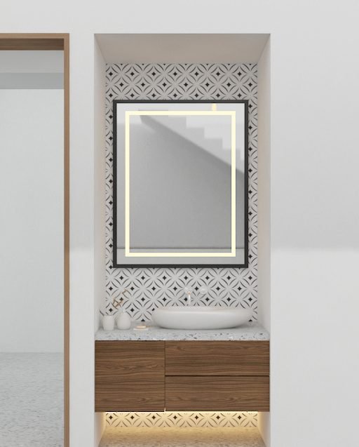 Wash basin with lit mirror